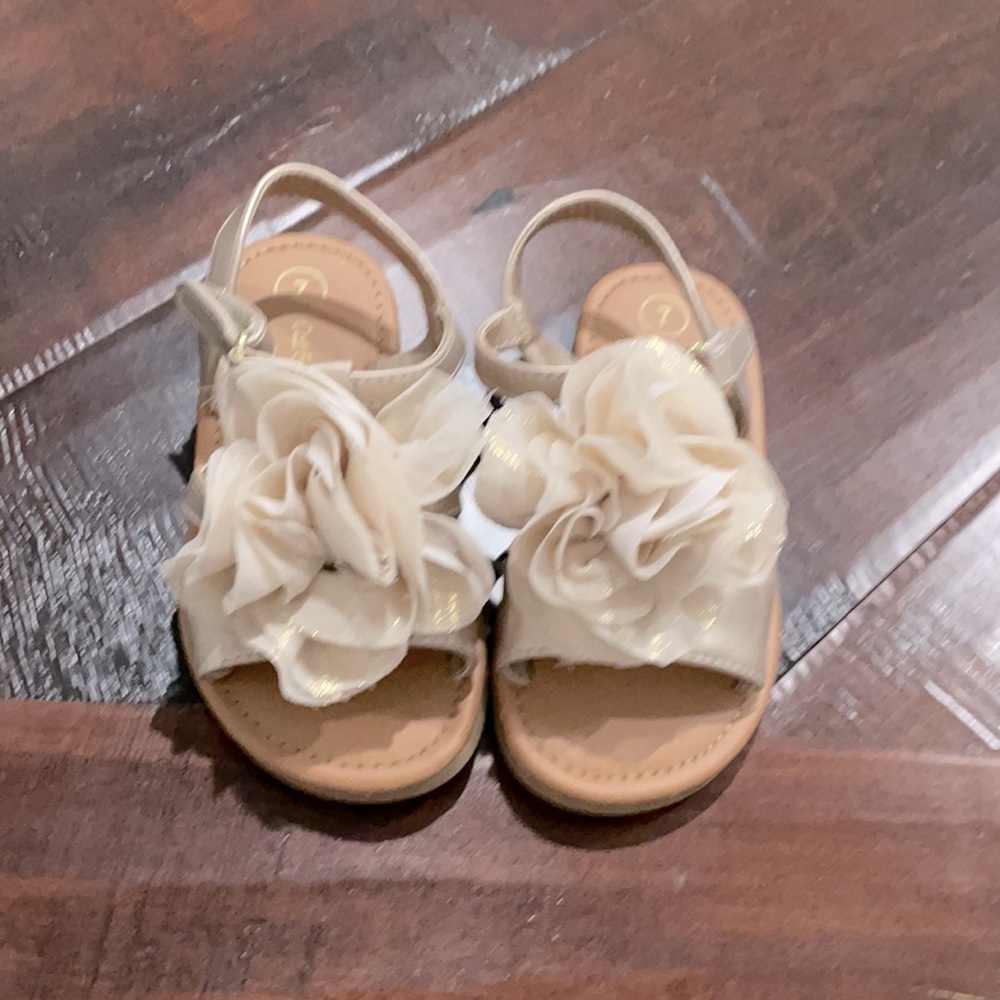 Gold sandals with big flower